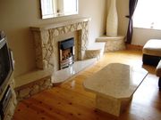 STONE FIREPLACE AND TABLE.JPG